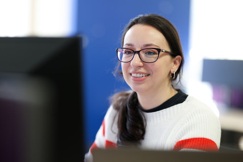 NECS employee working in our Durham office