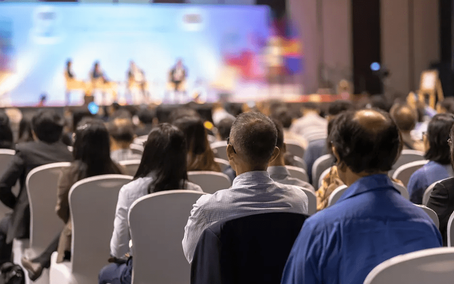 Stock image of conference hall from back of room