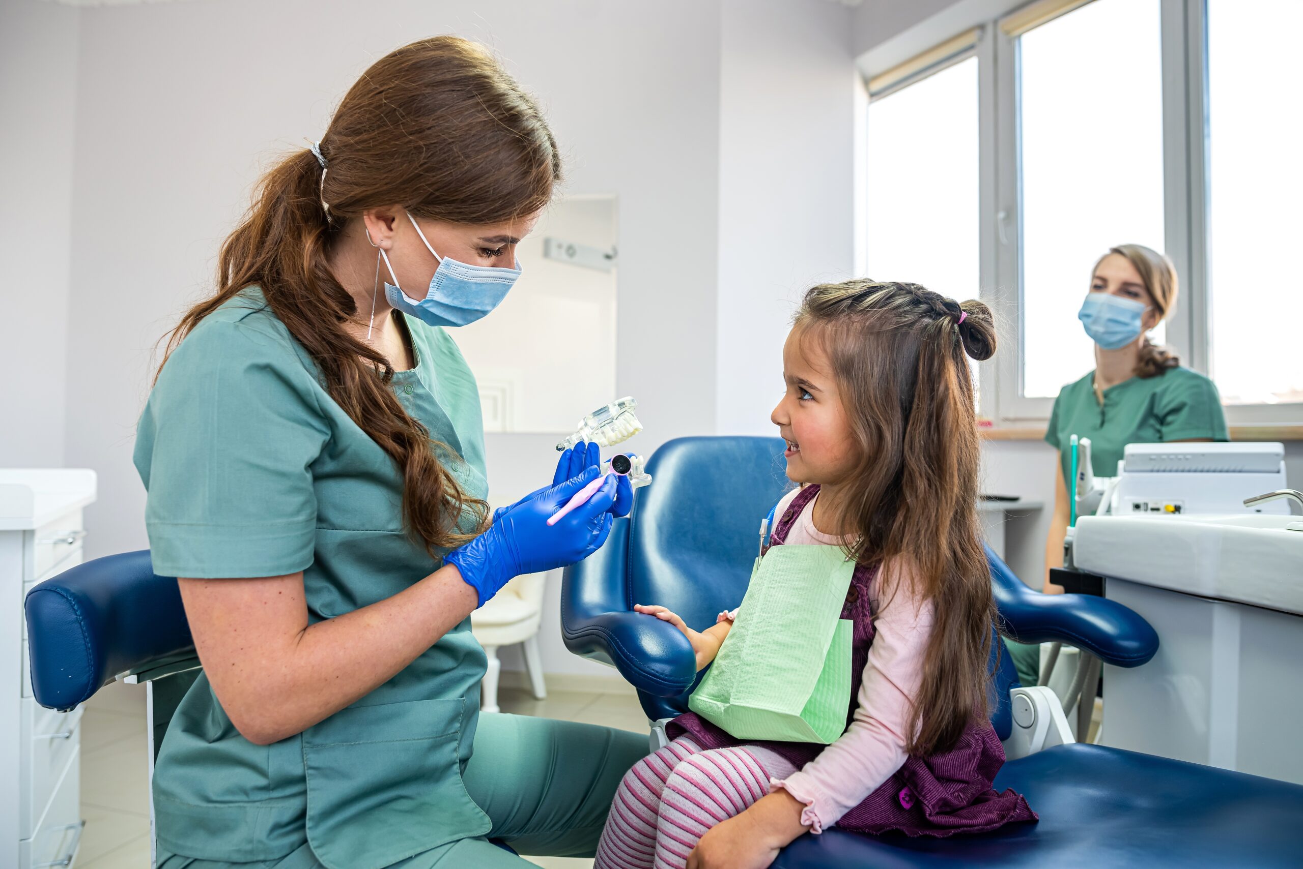 Girl sitting in dentists surgery