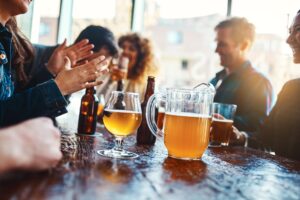 Reducing alcohol case study Table with alcohol drinks, people in bar