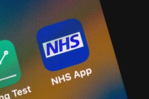 NHS App displayed on the home screen of a mobile phone
