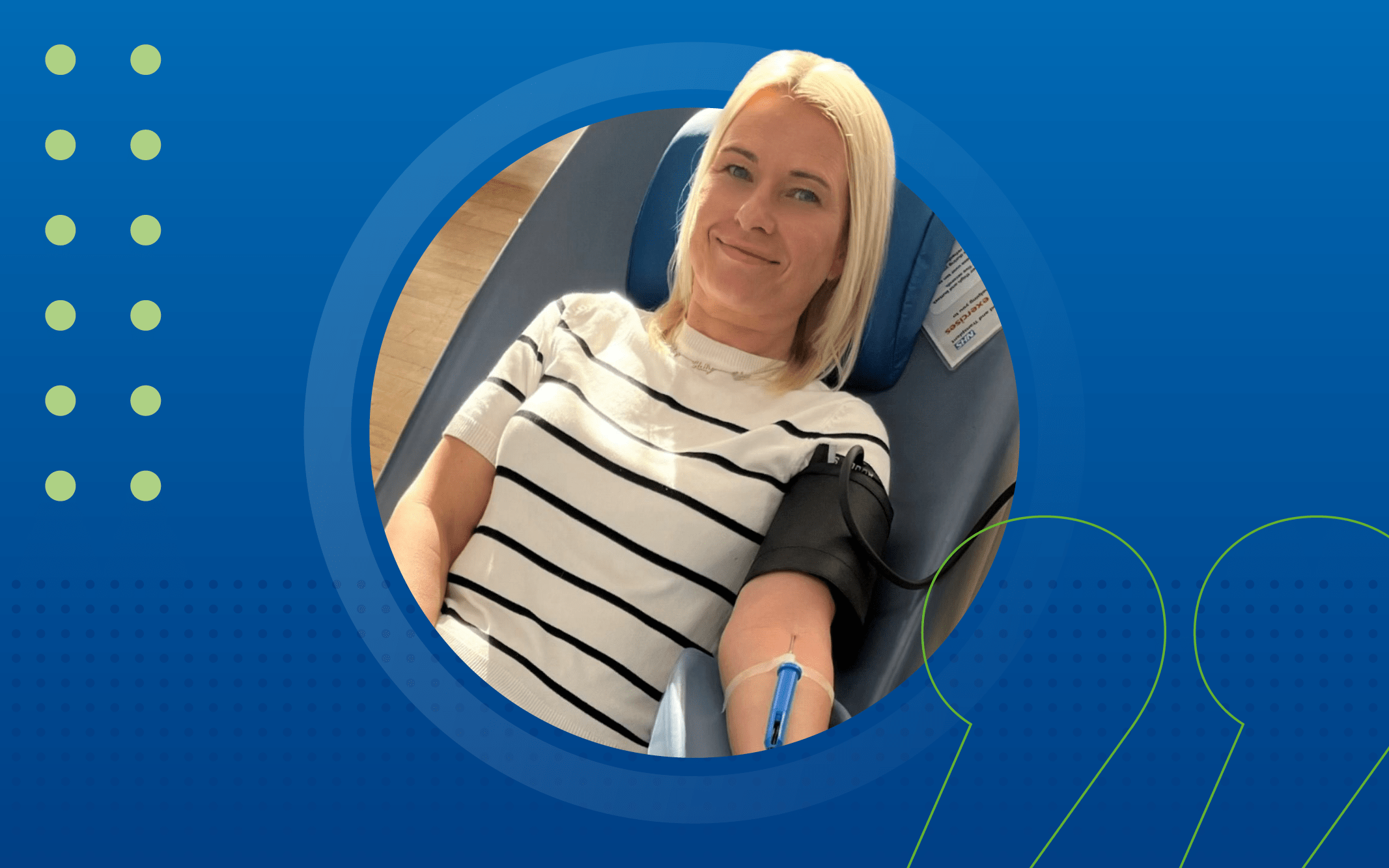 Lynne laid in a giveing blood chair with a needle collecting blood from her arm